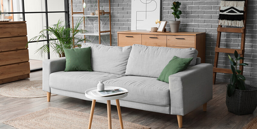 1003268701-salon-z-szara-cegla-na-scianie-i-szara-sofa-C77