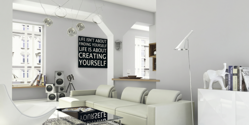 Salon z jasnym szarym kolorem ścian C29 szary piryt, nowoczesne wnętrze z dużą kanapą i eleganckimi dodatkami.